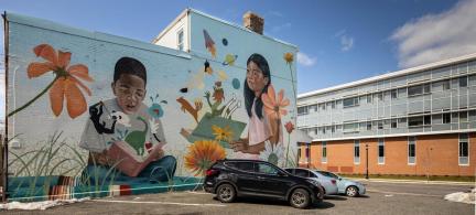 Mural of two children on a wall in Allentown, PA